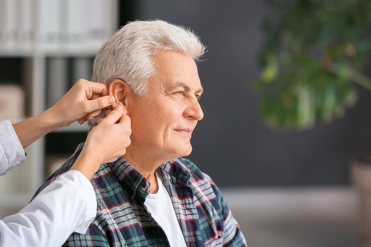 Man having his ear examined